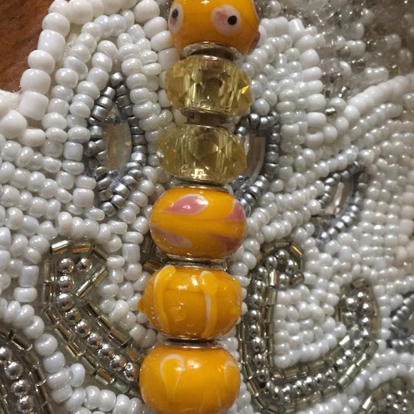 12 beads in various yellows and oranges. - Picture 3 of 5